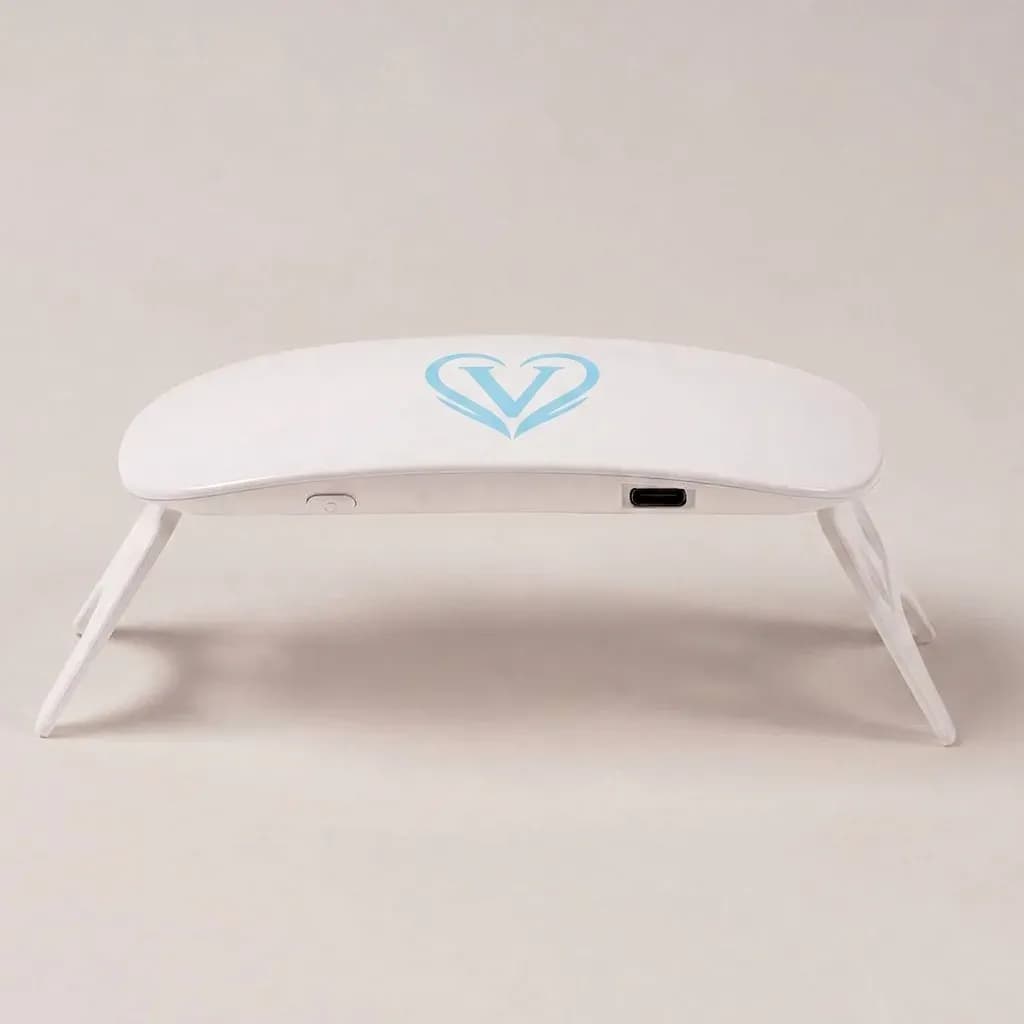 Velvora blue UV LED nail lamp side view showing the fold-out legs and USB-C port