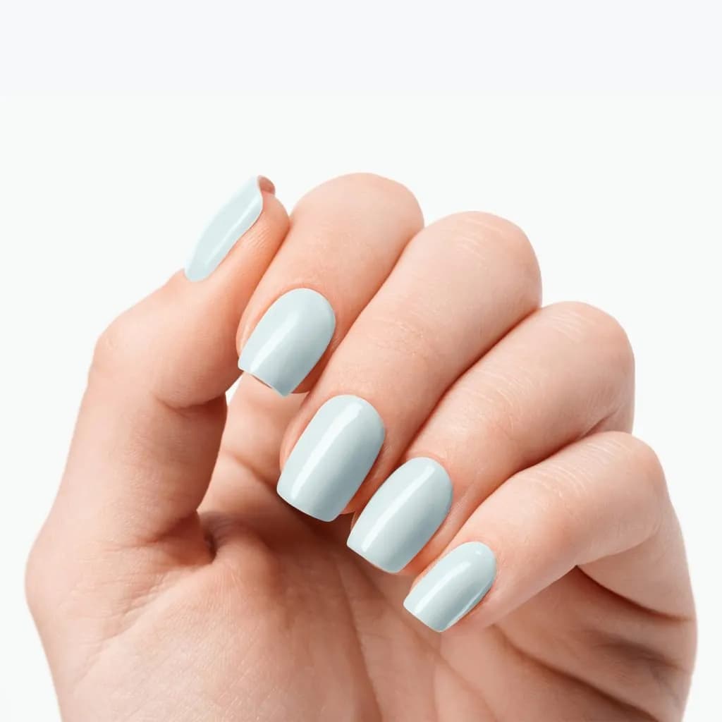 Coastal Breeze pale blue semi-cured gel nail strips shown on real nails
