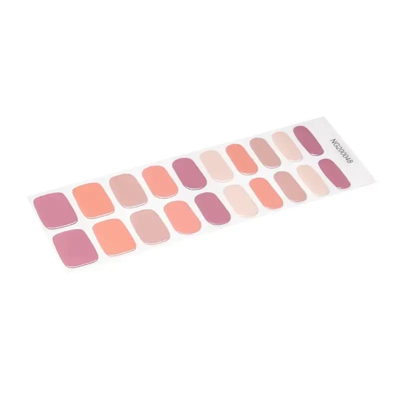 Neutral Harmony gel nail strip sheet in mauve, peach and cream shades, angled view