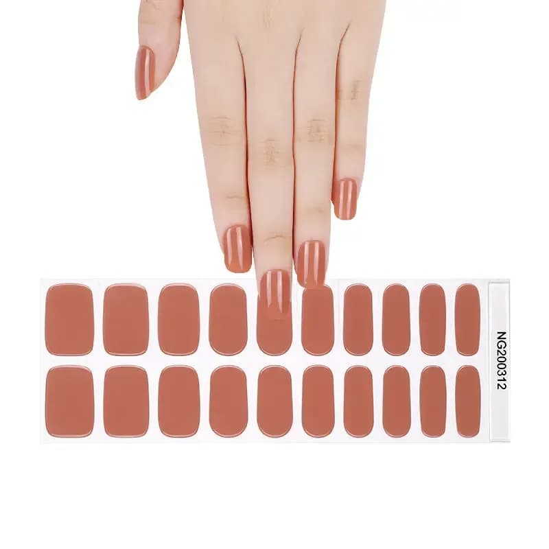 Nude Blossom warm terracotta nude gel nail strips, the full 20-strip sheet under a hand