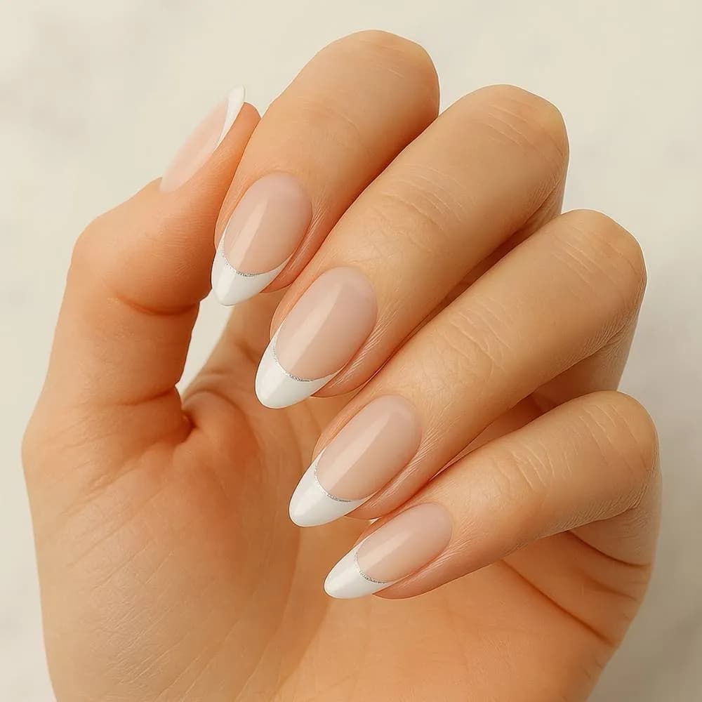 Silver Lined French Tip semi-cured gel nail strips, close up on real nails