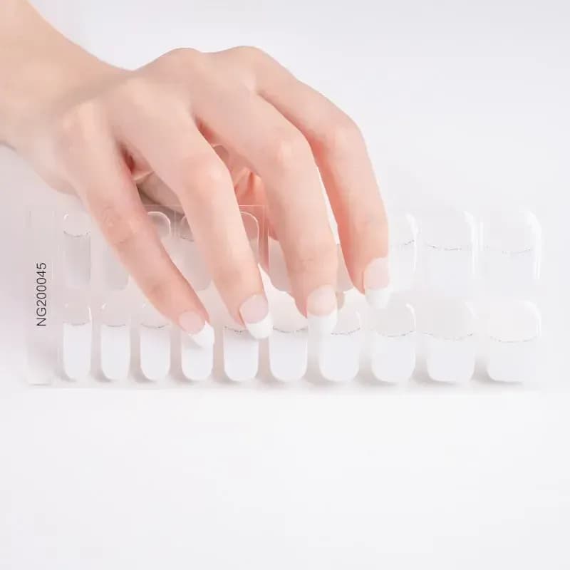 Silver Lined French Tip gel nail strips, the full 20-strip sheet under a manicured hand