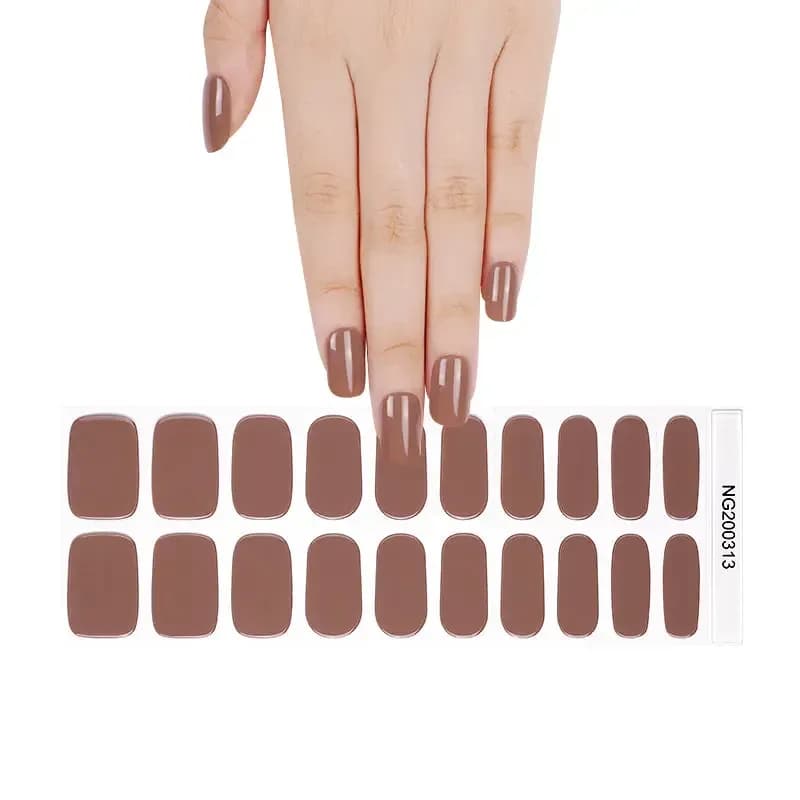Sweet Caramel warm brown gel nail strips, the full 20-strip sheet under a manicured hand