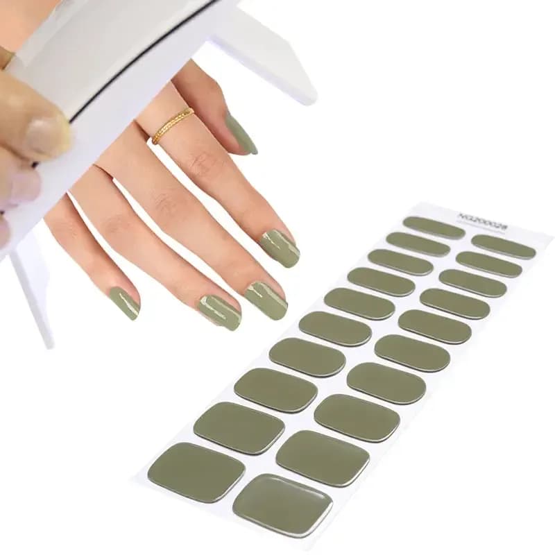 Curing Urban Jungle gel nail strips under an LED UV lamp