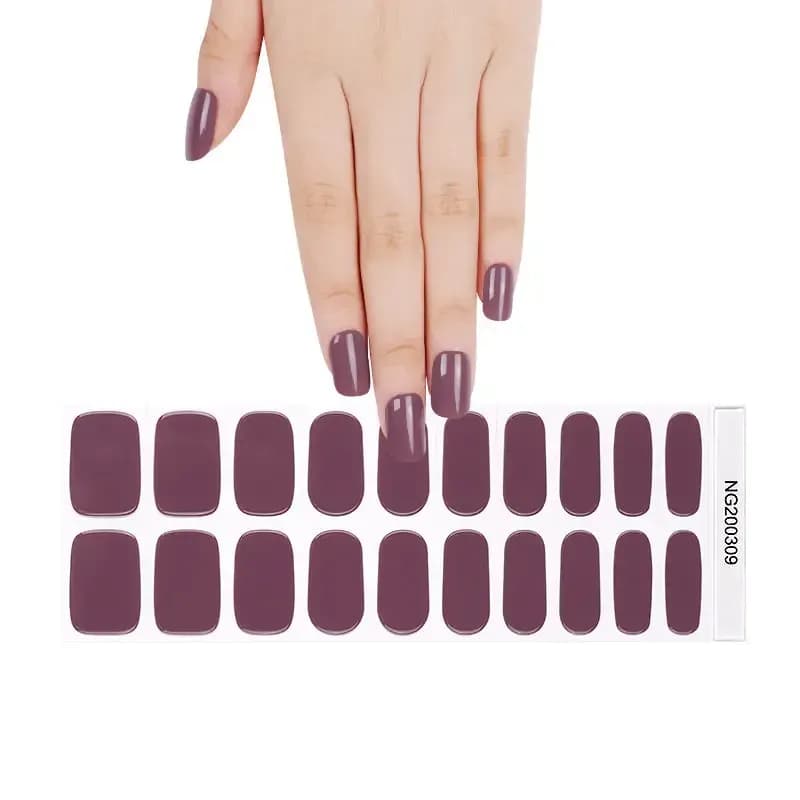 Vintage Rose dusty mauve gel nail strips, the full 20-strip sheet under a manicured hand