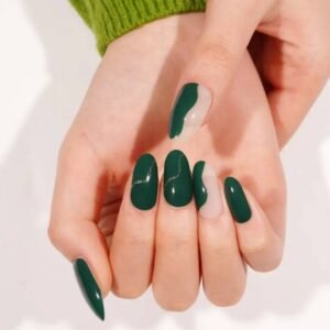 Close-up of Jungle Vibes semi-cured gel nail strips by Velvora – deep green and nude design with abstract curves, available in the UK