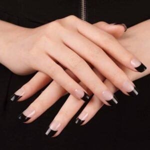 Velvora semi-cured black French tip gel strips on crossed hands—elegant, glossy, chip-free finish