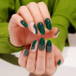 Both hands with Velvora Golden Ivy semi-cured gel nail wraps, showing mixed negative-space and full-coverage green designs.