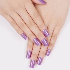 Velvora Holographic Amethyst gel nail strips on hands holding lavender handbag, shimmering violet holo finish.