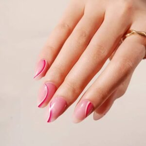 Side view of Pink Currents swirl nails with a gold twist ring.