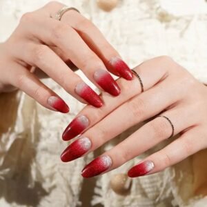 Both hands with Velvora Red Ombre glitter-gradient nail wraps. Statement yet wearable: Red Ombre on both hands.