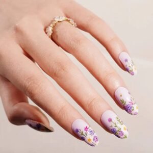 Close-up of a hand wearing Velvora Violet Blooms: lilac base with tiny violet, yellow and white flowers.